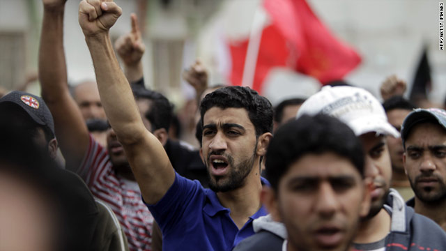 Bahraini Shiite men chant anti-government slogans in the Shiite town of Sitra on March 18.
