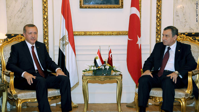 Activists tried to confront the Turkish Prime Minister, pictured here with Egyptian PM Essam Sharaf, while in Egpyt.