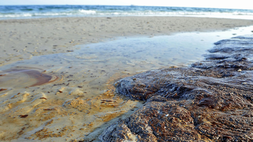 E. M. Pio Roda / CNN  A fresh patch of emulsified oil sits on the beach at Bon Secour National Wildlife Refuge in Gulf Shores, Alabama, on Sunday, June 13. - CNN