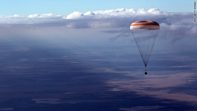 Astronauts return to earth