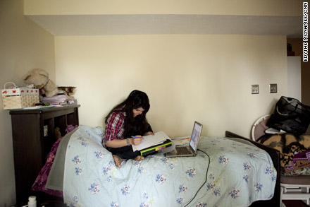 Aesha watches Bollywood films on her computer but also tunes into videos about her past and the torture of other women.