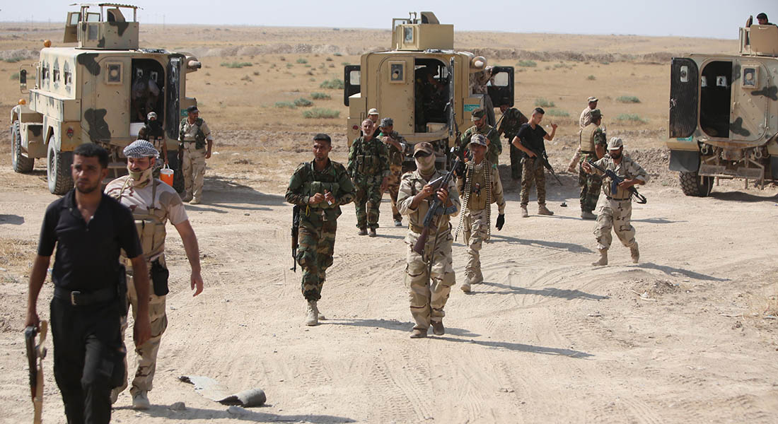 صحف العالم: صور تذكارية في العراق على جثث مقاتلي داعش - CNNArabic.com