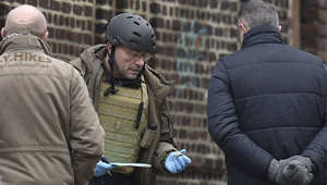 محققون جنائيون في موقع الغارة على خلية إرهابية في مدينة فيرفيه شرق بلجيكا 16 يناير/ كانون الثاني 2015
