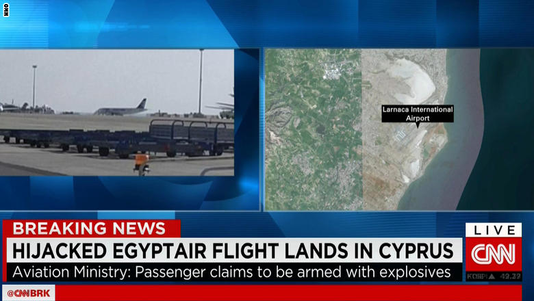 الصورة الأولى لطائرة "مصر للطيران" المخطوفة بتهديد "حزام ناسف" بعد هبوطها بمطار لارنكا القبرصي Egypt%20Air