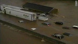 Aerial footage shows submerged vehicles on I-24 in Nashville on Saturday.