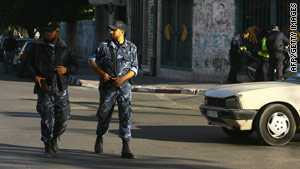 Hamas police patrol the streets of Gaza City on Thursday.