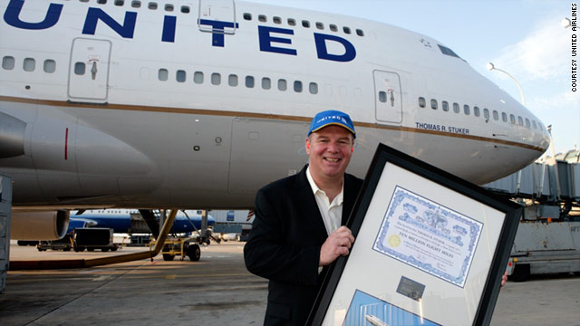 Tom Stuker Poses In Front Of The United Boeing 747 400 Named His Honor