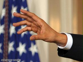 مد أوباما يده إلى شعوب العالم لمواجهة الأزمة الاقتصادية غير المسبوقة
