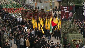 استعراض لأنصار حزب الله بأحد شوارع بيورت