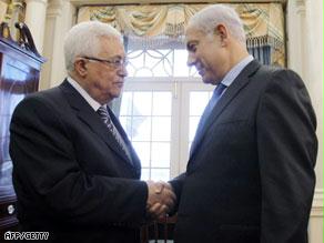عباس يصافح نتنياهو في واشنطن