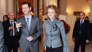 أسماء الأسد برفقة زوجها بشار في إحدى الفعاليات