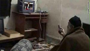 مقطع فيديو مأخوذ من مقر بن لادن، يبدو فيه وهو يشاهد التلفاز
