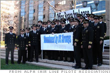Delta pilots protesting the proposed purchase of their airline by US Airways.